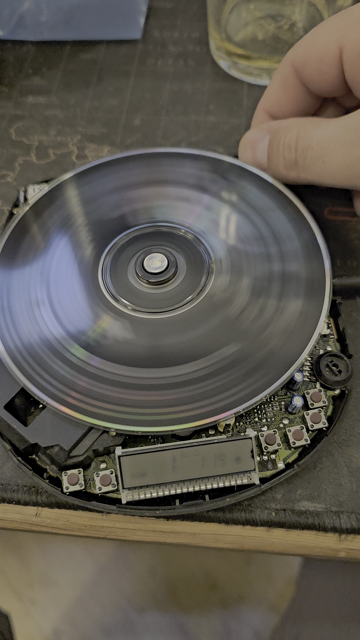 Open CD-player surgery.